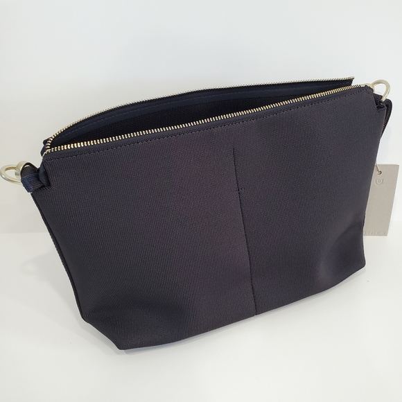 Rothy's Bags Rothys The Daily Crossbody Bag Ink And Ivory Poshmark